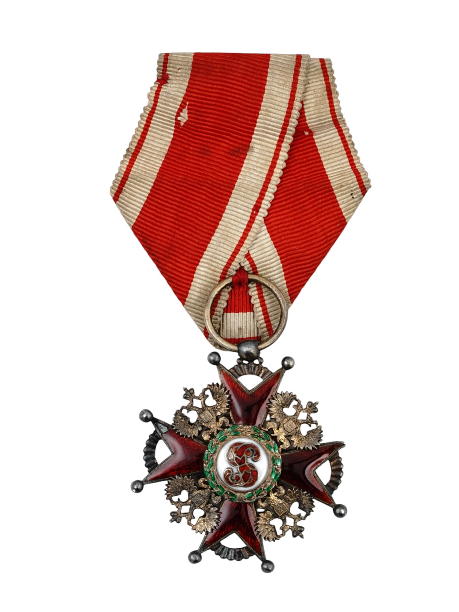 A RUSSIAN ORDER OF ST. STANISLAUS 3RD CLASS WITH RIBBON: Russian cross of the Order of Saint Stanislas Civil Division 3rd class with ribbon. Width: 40 mm. Russia, late 19th - early 20th century. Dimensions: 1 5/8 x 1 5/8 in., (40 x 40 mm.) Please make all i