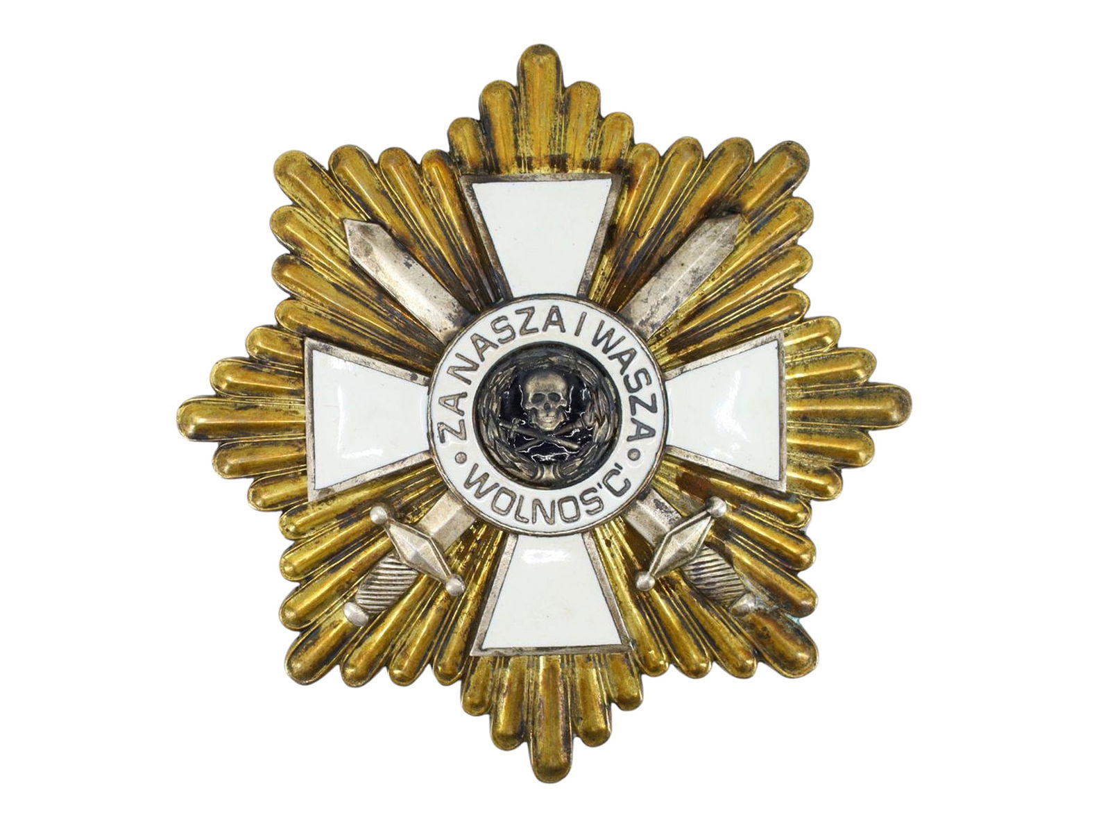 A POLISH STAR OF GENERAL BU?AK BA?ACHOWICZ CROSS OF VALOUR: A POLISH STAR OF GENERAL BU?AK-BA?ACHOWICZ, CROSS OF VALOUR, CIRCA 1919–1920. A large gilt and silvered star-shaped badge, with a central white-enamel cross, the medallion depicting a silver skull-a