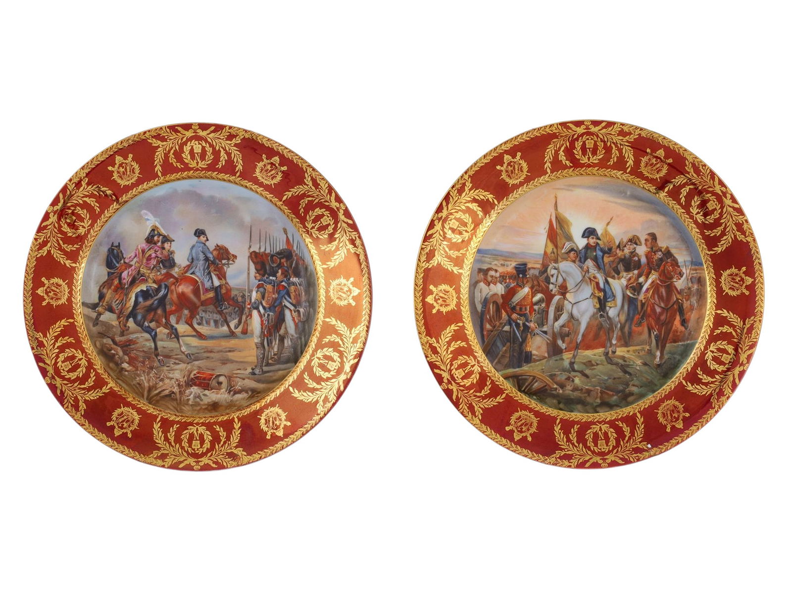A PAIR OF PAINTED PORCELAIN PLATES WITH NAPOLEONIC BATTLE SCENES, LATE 19TH C.: A pair of porcelain plates decorated with Napoleon sceneries, puce border with gold decoration. The decal motifs depict "The Battle of Jena," and "Napoleon at the Battle of Friedland", after Horace Ve