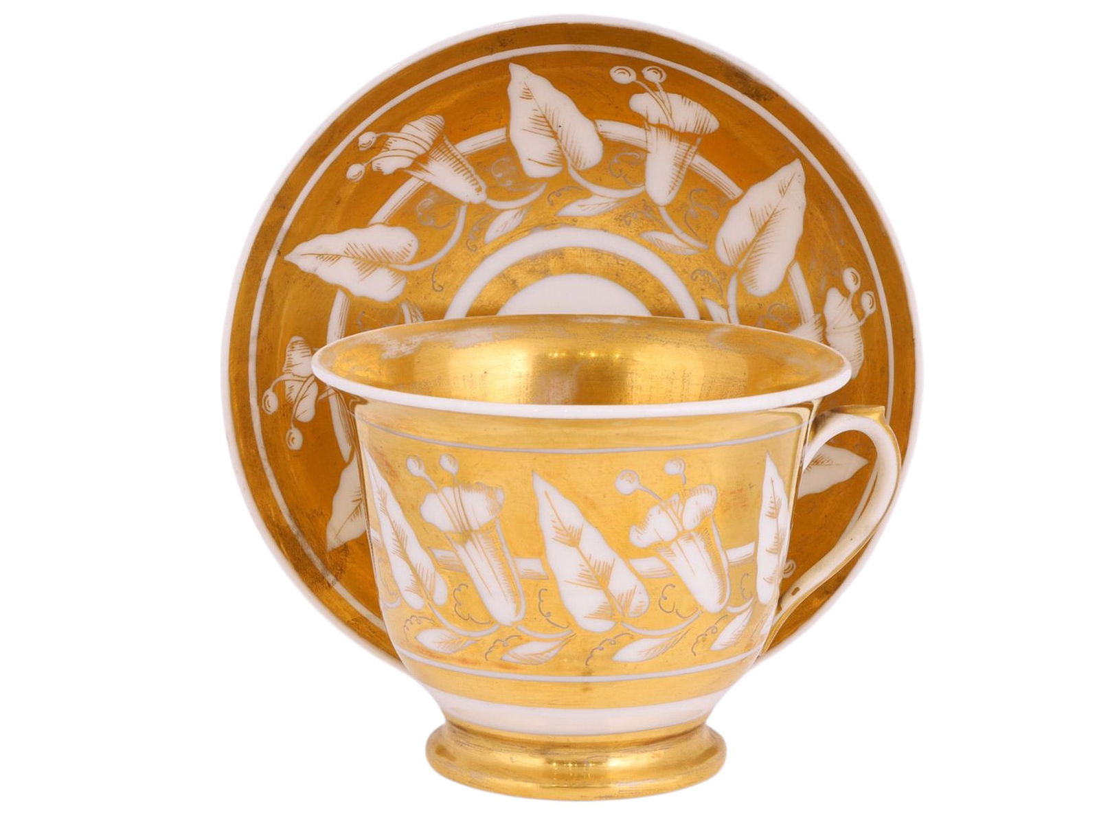 A GILT-DECORATED EUROPEAN PORCELAIN TEACUP AND SAUCER, PROBABLY CENTRAL EUROPE, MID-19TH CENTURY (1 of 6)