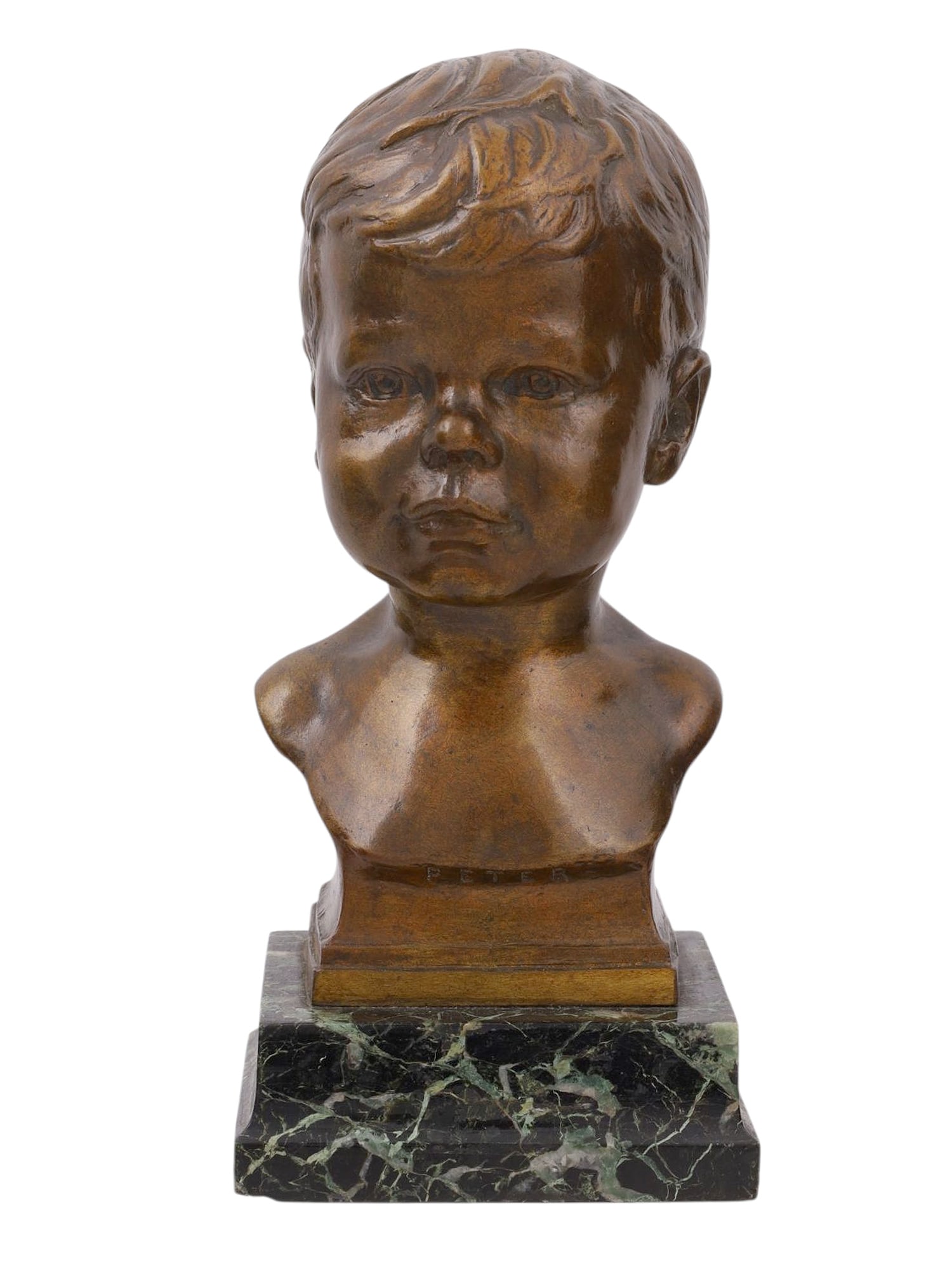 A BRONZE BUST OF AN INFANT BOY 'PETER', C. 1924: A bronze bust depicting a young boy, inscribed with the name 'Peter'. This piece likely depicts a specific person, perhaps the son of the patron who commissioned this piece, considering both the name