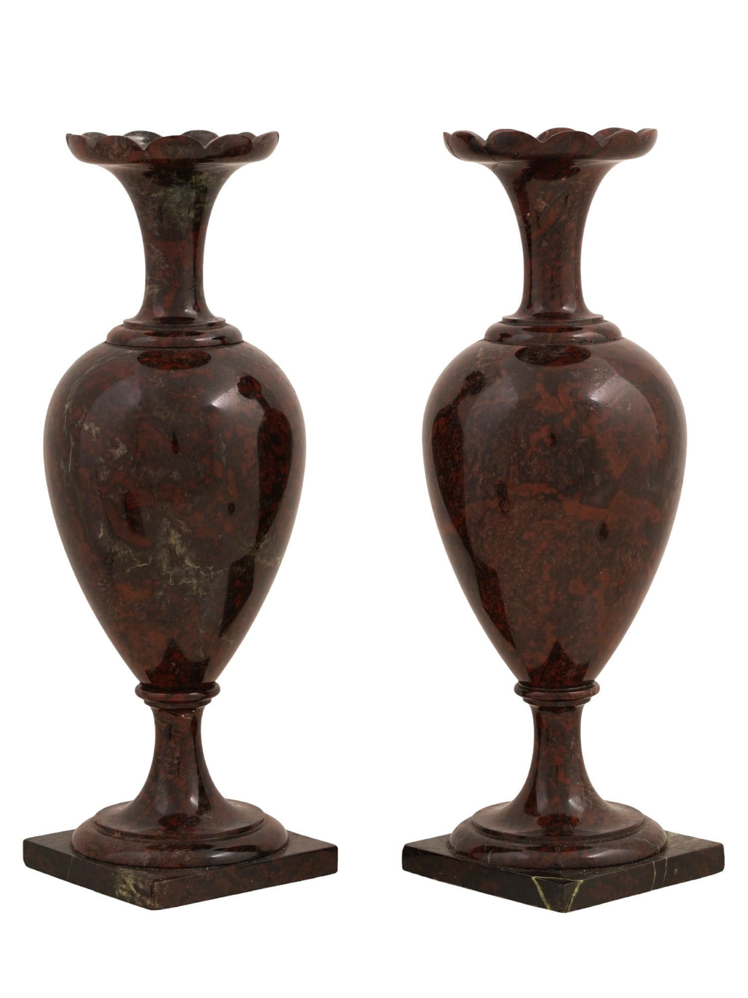 A PAIR OF CARVED BRECCIATED JASPER URN VASES, 19TH CEN.: Pair of Neoclassical brecciated jasper urns. Eelgantly carved with a baluster-shaped body and a flared neck with a wavy upper rim. Each is raised on a square black marble base. Provenance: Ex. Christi