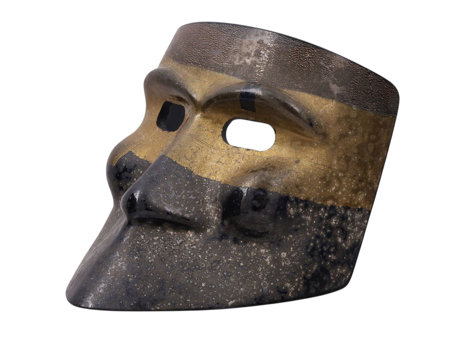 A SIGNED VENETIAN GLASS CARNIVAL MASK, 20TH CEN.: A Venetian glass Carnival / Carnevale mask of a black color with a long, pointed chin, a gilt band across the eyes, and unusual texturing across the surface. The verso is signed by the artist, but we