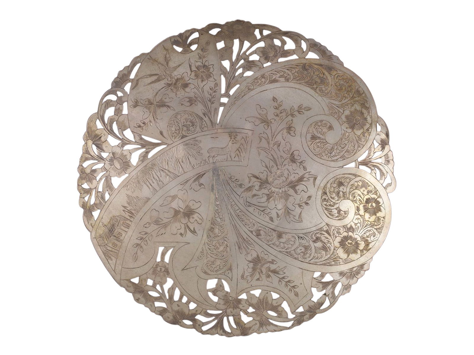 A RUSSIAN 19TH-CENTURY ENGRAVED SILVER SCENIC TRAY: A RUSSIAN SILVER SCENIC TRAY. Russia, 19th century. Of circular form on three applied feet, the lobed rim with pierced floral scrollwork, the center finely engraved with scrolling foliage and stylized