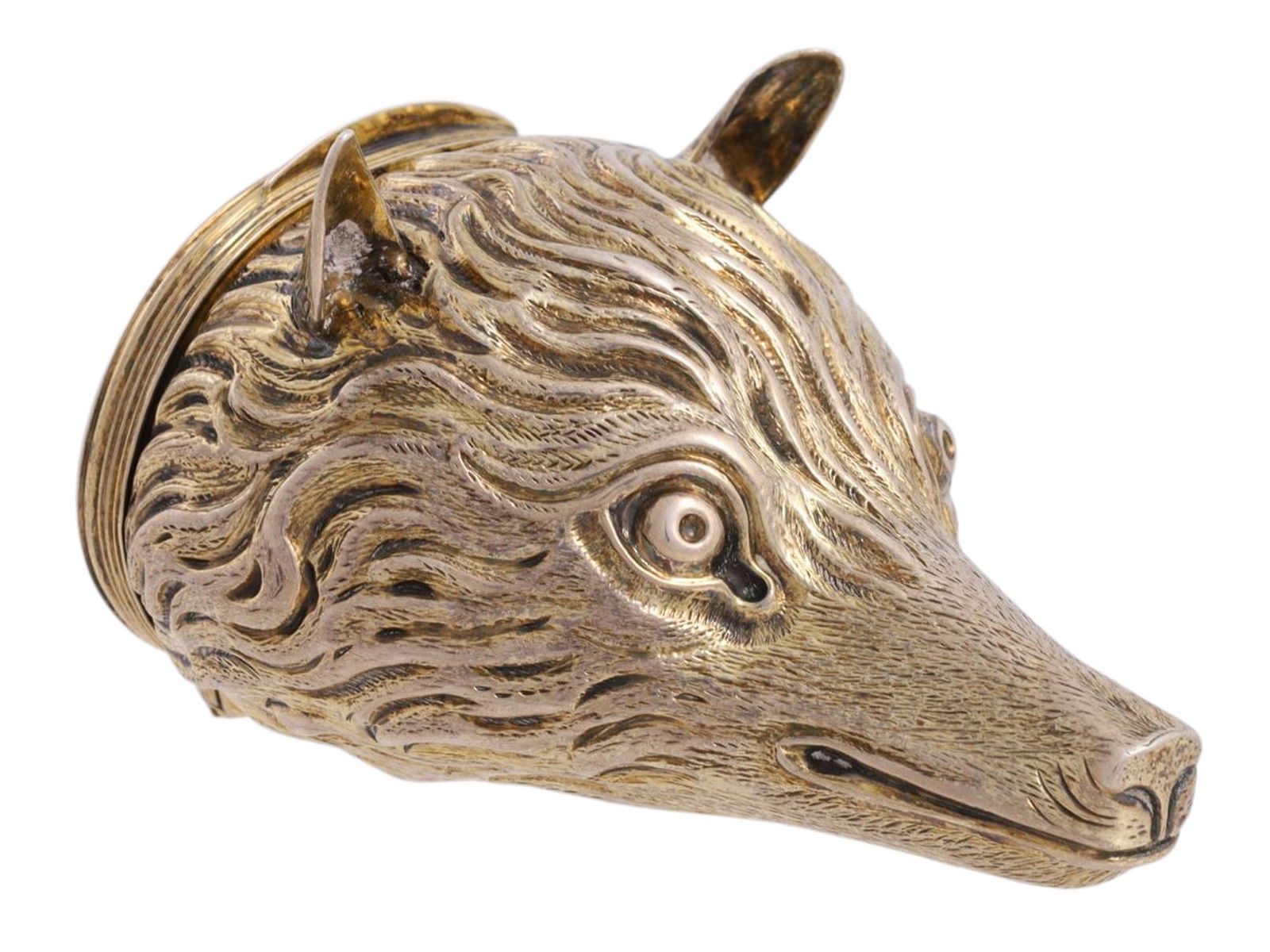 AN ENGLISH GILT-SILVER SNUFF BOX IN THE FORM OF A BEAR’S HEAD, LONDON, EARLY 19TH CENTURY: Realistically modeled as the head of a bear, the elongated snout with engraved mouth and nostrils, the fur finely chased in flowing curls, the upright ears naturalistically formed, and the eyes inset
