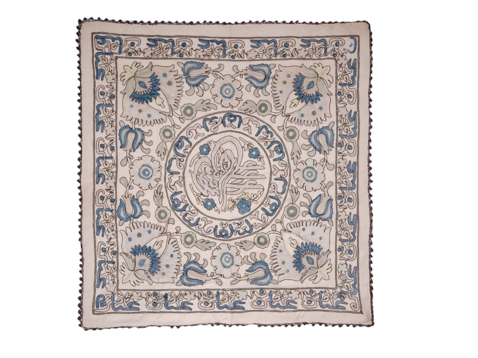 AN OTTOMAN TURKISH EMBROIDERY TEXTILE WITH A TUGRA, 19TH CENTURY: A traditional Ottoman embroidered panel, possibly a turban cover, prayer cloth, or a decorative wall hanging (börek cover), from the second part of the 19th century. The calligraphic centerpiece feat