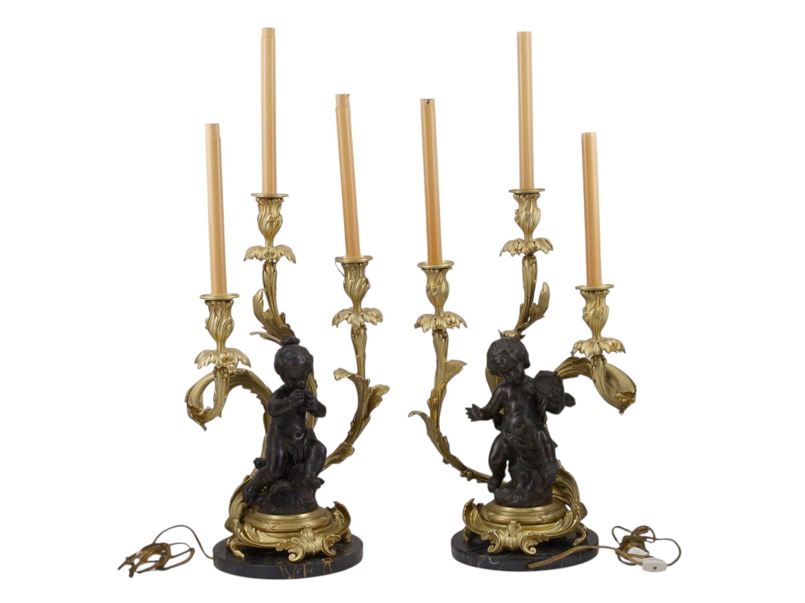 A PAIR OF FRENCH GILT AND PATINATED BRONZE THREE-LIGHT CANDELABRA WITH PUTTI (1 of 4)