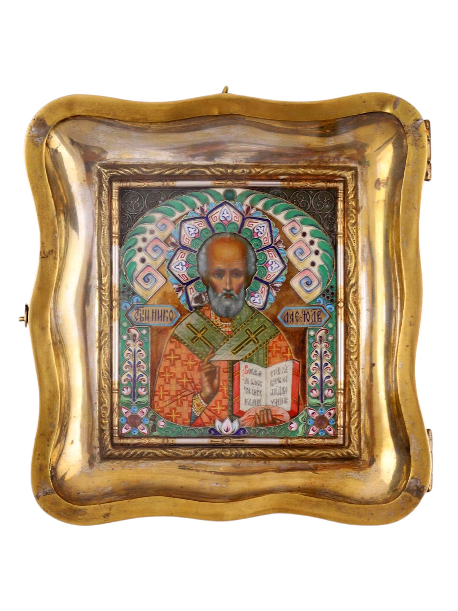 A RUSSIAN SILVER AND CLOISONNE ENAMEL ICON OF ST. NICHOLAS, 19 C.: The rectangular icon depicting Saint Nicholas the Wonderworker is shown half-length, blessing with his right hand and holding an open Gospel in his left. The saint is portrayed with a high forehead an