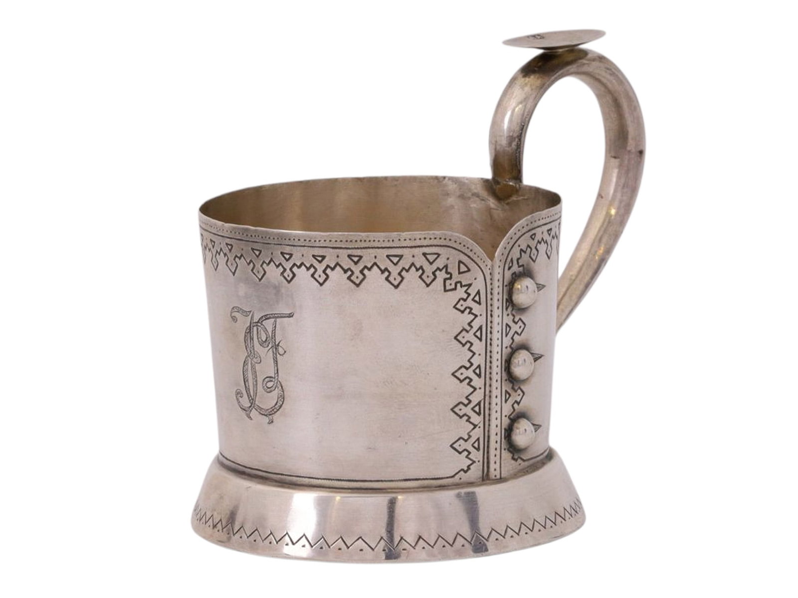 A RUSSIAN SILVER TEAGLASS HOLDER, IMITATING CUFF WITH BUTTONS, 19TH CEN.: A cylindrical tea glass holder with a smooth handle shaped like a shirt cuff or the buttoned placket of a vest, decorated with a geometric pattern around the rim that imitates embroidery, and three &#