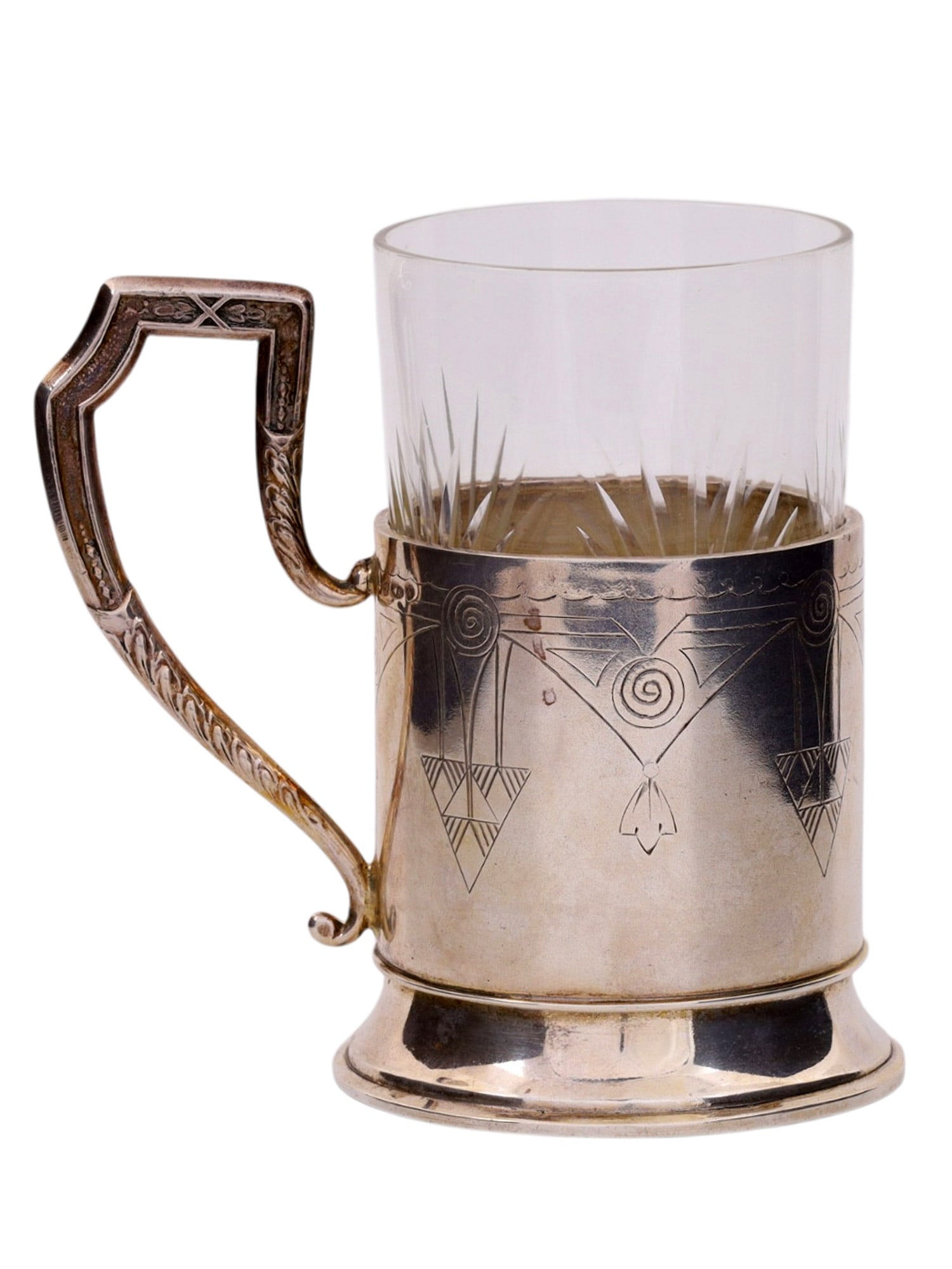 A RUSSIAN SILVER TEA GLASS HOLDER IN THE ART NOUVEAU STYLE, 19 C.: A Russian silver tea glass holder with engraved decorations and a cut-crystal cup. Made in Moscow by the workshop of S. Kazakov. Marked on the bottom with SK in Cyrillic, 84 Russian silver standard, t