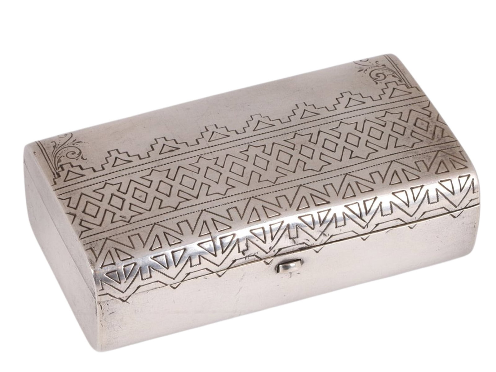 A RUSSIAN ENGRAVED SILVER CIGARETTE CASE IN PAN-SLAVIC STYLE: A Russian silver cigarette case with a hinged lid which has been delicately engraved with interlacing geometric patterns in the Pan-Slavic style. The Weight: 3.8 oz., (108 g.) Dimensions: 3 3/8 x 1 7/