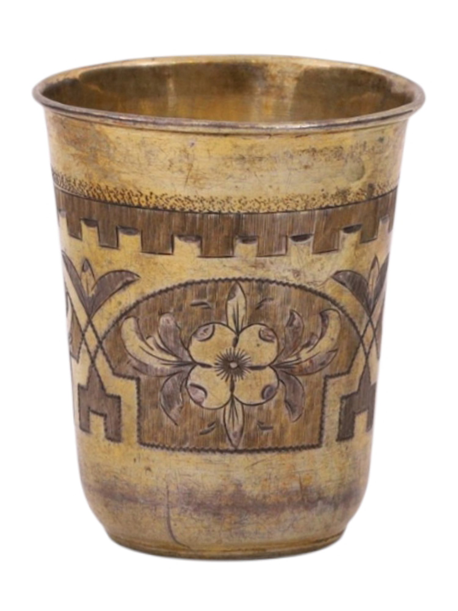 A RUSSIAN PARCEL-GILT SILVER SHOT GLASS IN THE NEO-RUSSIAN STYLE, 1881: A Russian parcel-gilt silver shot glass with engravings in the Neo-Russian style.Hallmarks: Illegible assayer's mark over 1881 date mark, 84 silver proof, St George Moscow's mark, illegible maker's ma