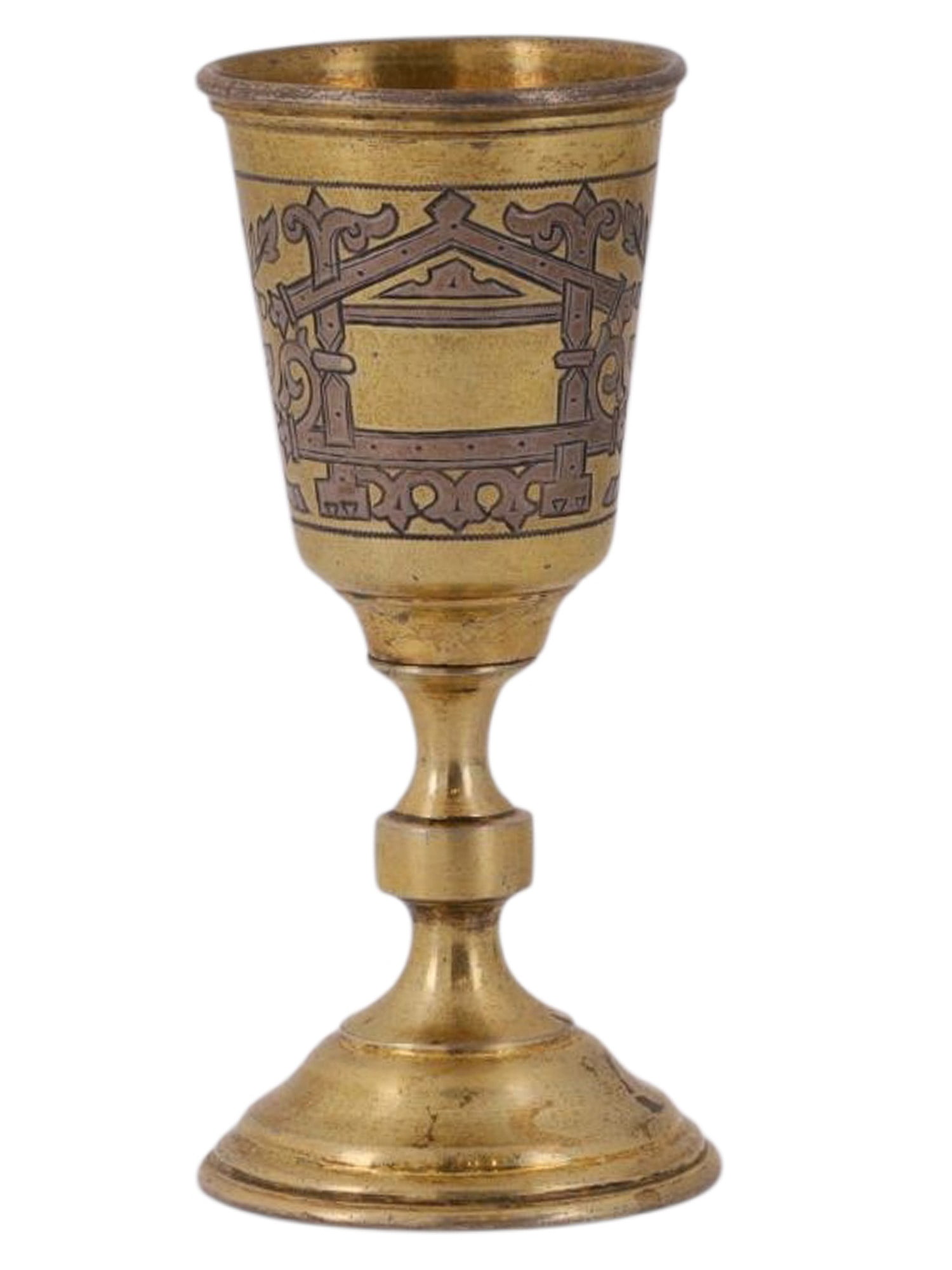 A RUSSIAN GILT-SILVER SHOT GLASS WITH FLORAL ENGRAVING: A Russian gilt-silver shot glass with engraved foliate motifs surrounding a Neo-Russian style frame left blank for a monogram. The body is sat atop a lathe-turned base.Hallmarks: 84 silver proof with 