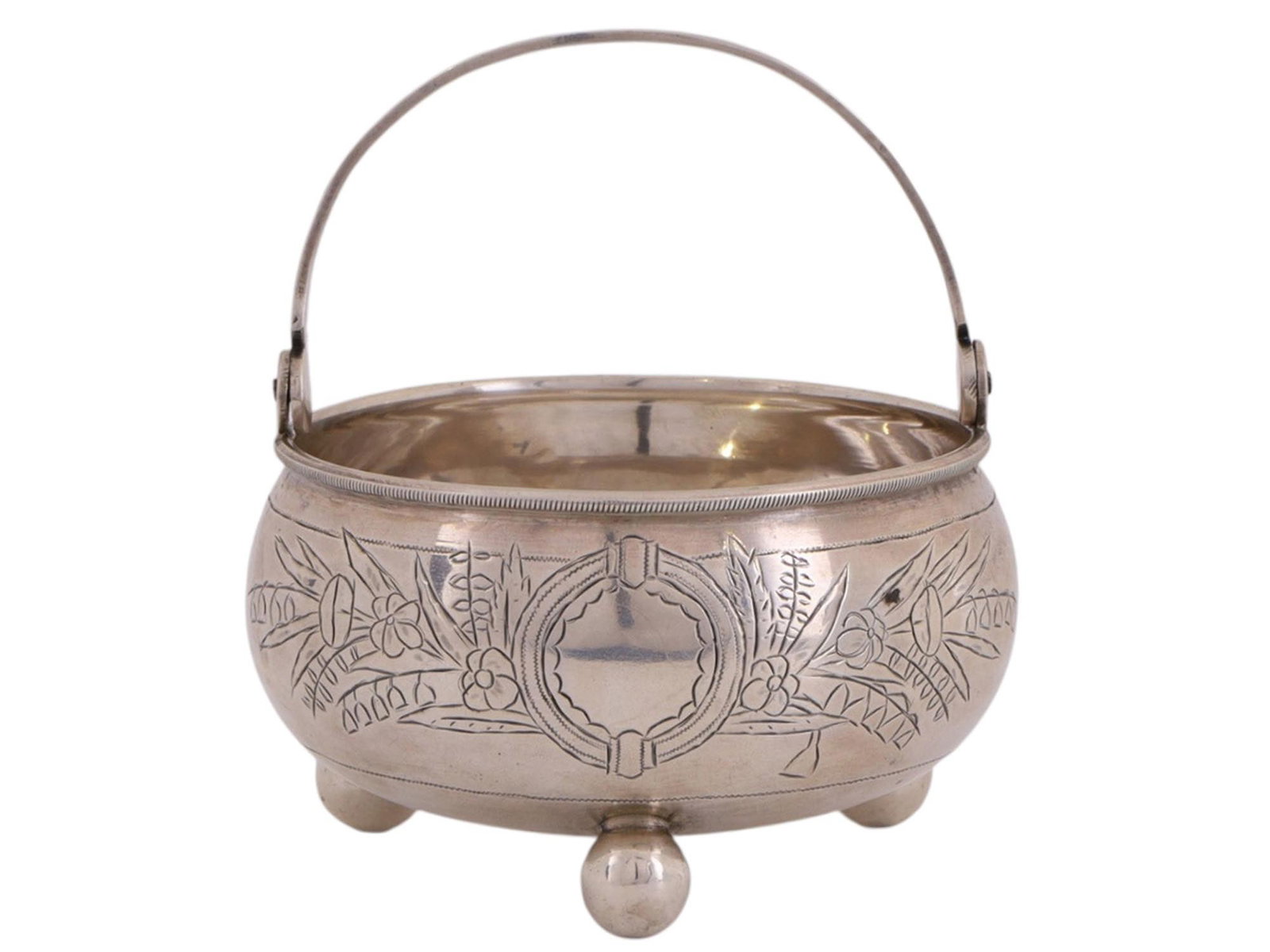 RUSSIAN SILVER SUGAR BOWL WITH FLORAL DECORATION, UNKNOWN WORKSHOP, MOSCOW, 1891: Of circular, bulbous form with a handle, raised on three ball feet, the body engraved with a composition of leaves and flowers forming a decorative medallion. The proportions and ornament reflect late