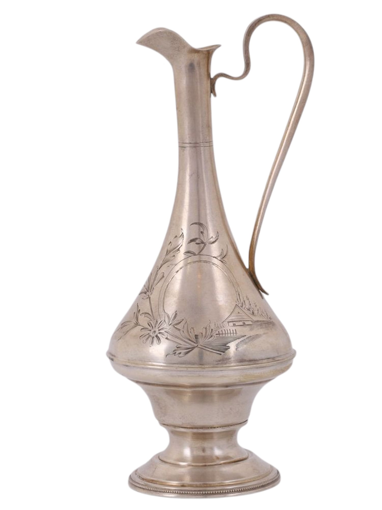 A RUSSIAN SILVER EWER WITH FLORAL ENGRAVING AND VILLAGE SCENE: A Russian silver ewer decorated with delicate floral engraving along its body, as well as a small view of a traditional Russian peasant home. The ewer has a wide belly which flows into a slender neck 