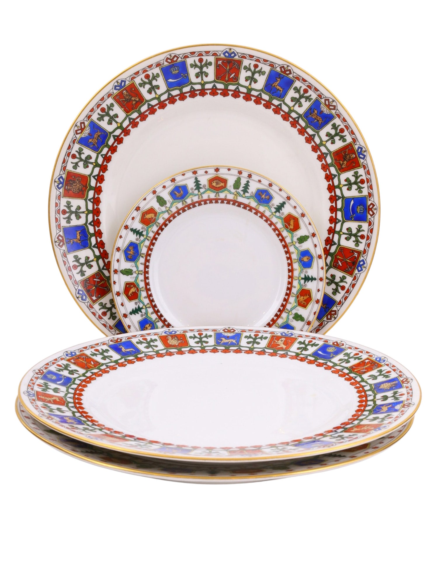A RUSSIAN KORNILOV PORCELAIN 4-PC PLATE SET, FOR TIFFANY NEW YORK, EARLY 20TH CENTURY: A set of four plates produced by the Kornilov Brothers Porcelain Manufactory for Tiffany & Co of New York. Each plate is decorated in the Pan-Slavic style, with alternating red and blue sections beari