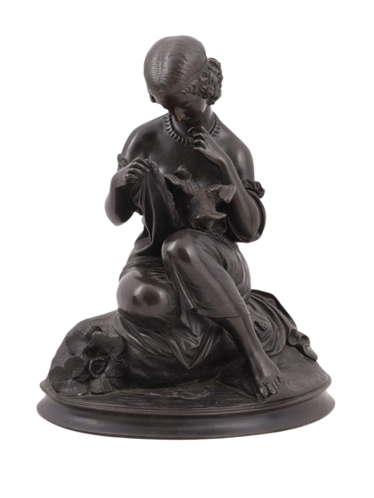 A CHRISTOPHER FRATIN (1801-1864) SIGNED BRONZE WOMAN WITH BIRD, 1849: A finely detailed bronze by French sculptor Christopher Fratin (1801-1864) depicting a young woman seated by a pond, holding open the front of her dress to allow a bird to sit close to her breast. The