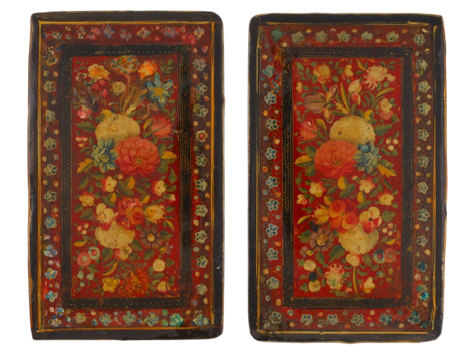 A PAIR OF QAJAR LACQUER BOOK COVERS (BINDINGS), PERSIA, 19TH CENTURY (1 of 2)