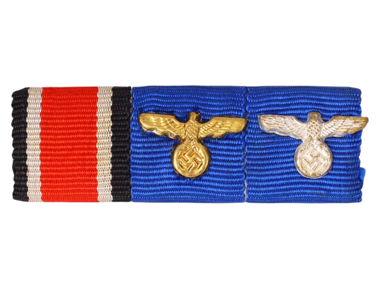A GERMAN RIBBON BAR WITH LONG SERVICE DEVICES, THIRD REICH PERIOD: Ribbon bar comprising three awards mounted for wear. The first ribbon appears to represent the Iron Cross 2nd Class ribbon (black, white, and red stripes). The second and third ribbons are for the Fai