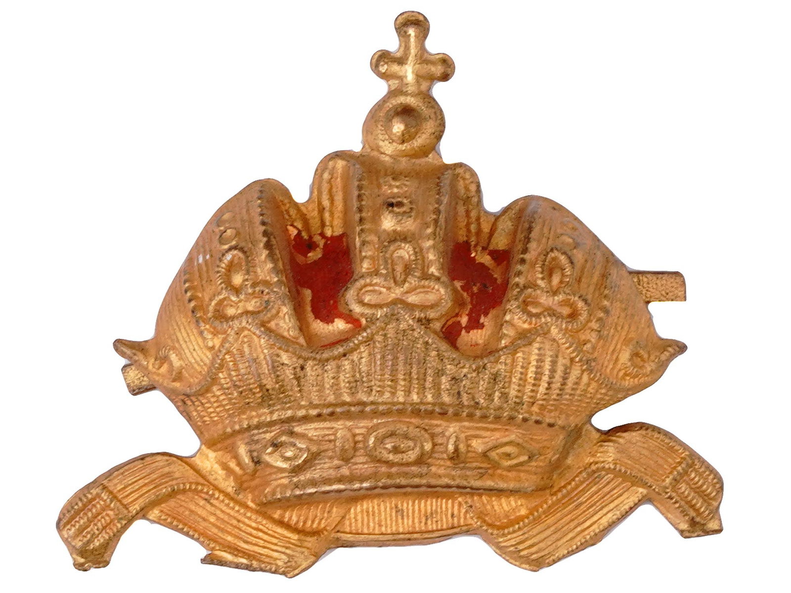 A GILT-BRONZE BADGE OF THE AUSTRIAN CROWN WITH PINBACK: A pinback badge made of gilt-bronze and depicting the shape of the Austrian Crown. Dimensions: L: 1 3/8 in., (3.5 cm.) Please make all inquiries before bidding. All lots are sold "as-is", refer to our