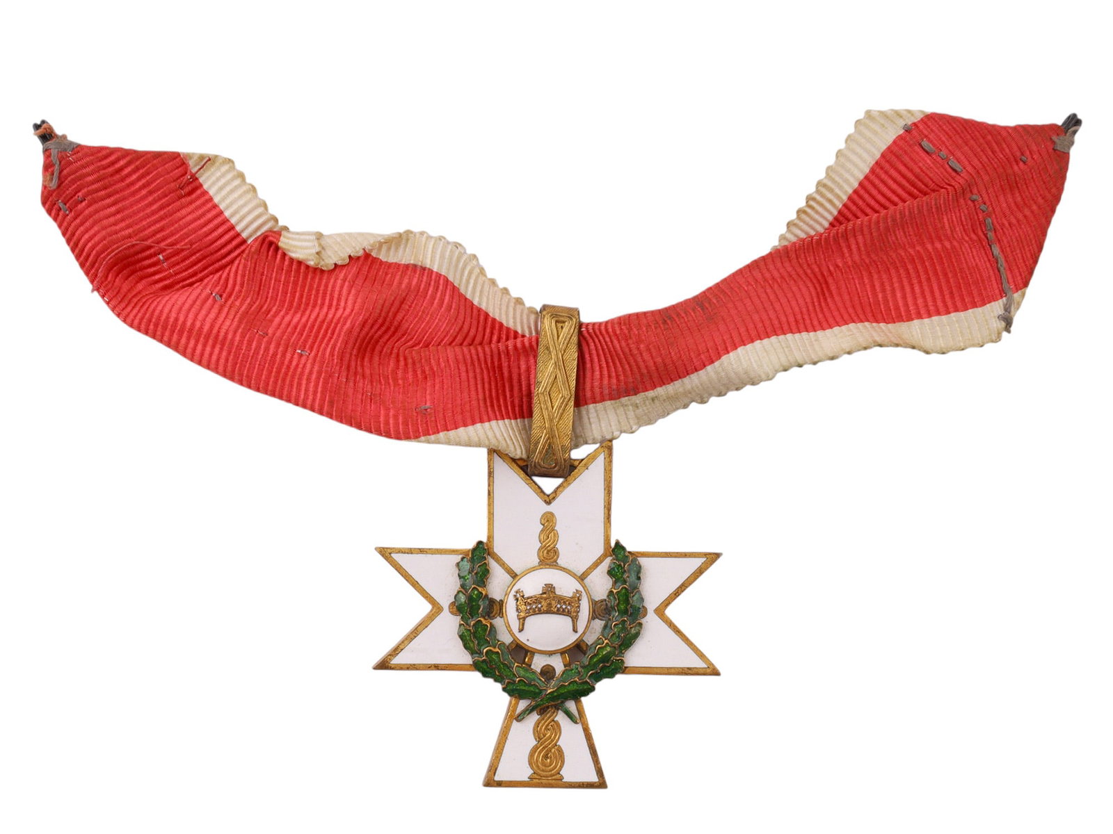 AN ORDER OF THE CROWN OF KING ZVONIMIR, COMMANDER GRADE NECK BADGE, INDEPENDENT STATE OF CROATIA: Constructed of gilt and enameled metal in the form of a six-pointed white enamel cross with bifurcated arms, the obverse centered by a circular medallion bearing the Crown of King Zvonimir, surrounded