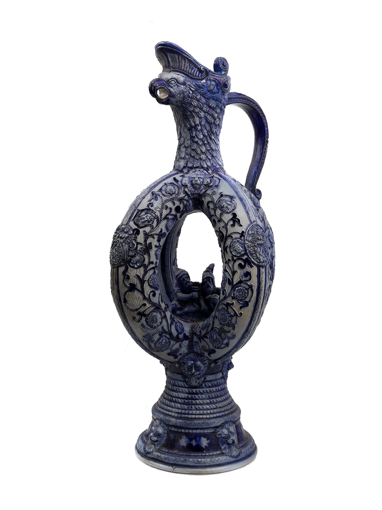 A GERMAN GLAZED CERAMIC PRETZEL EWER WITH DWARFS (1 of 7)