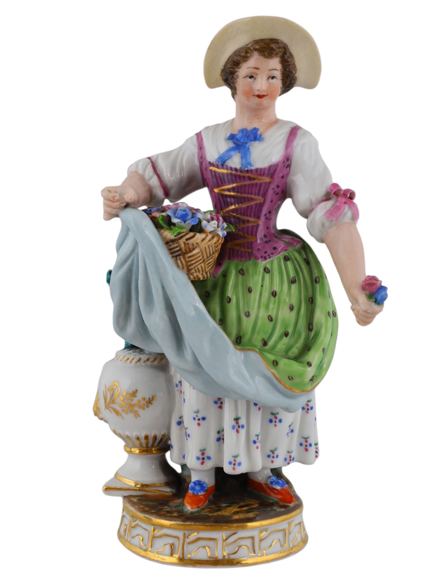 A RUSSIAN POPOV PORCELAIN FIGURE OF A WOMAN WITH FLOWERS: Popov Porcelain Manufactory, Gorbunovo, Moscow, mid-19th century.Naturalistically modelled and polychrome-painted as a young flower seller wearing a broad-brimmed hat, puce bodice, green overskirt and