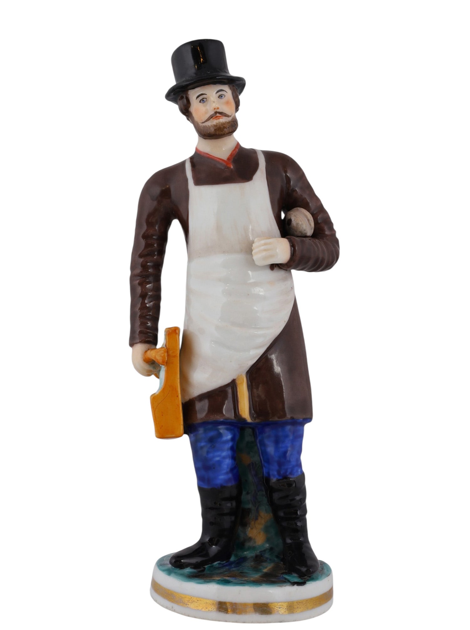 A RUSSIAN PORCELAIN FIGURE OF A GLAZIER, 19TH CENTURY: A Russian porcelain figure of a glazier (glassworker) with his top hat, glass holder, and apron. He stands atop a circular base with abstract colors and a gilt ring. The underside is unmarked. The fig