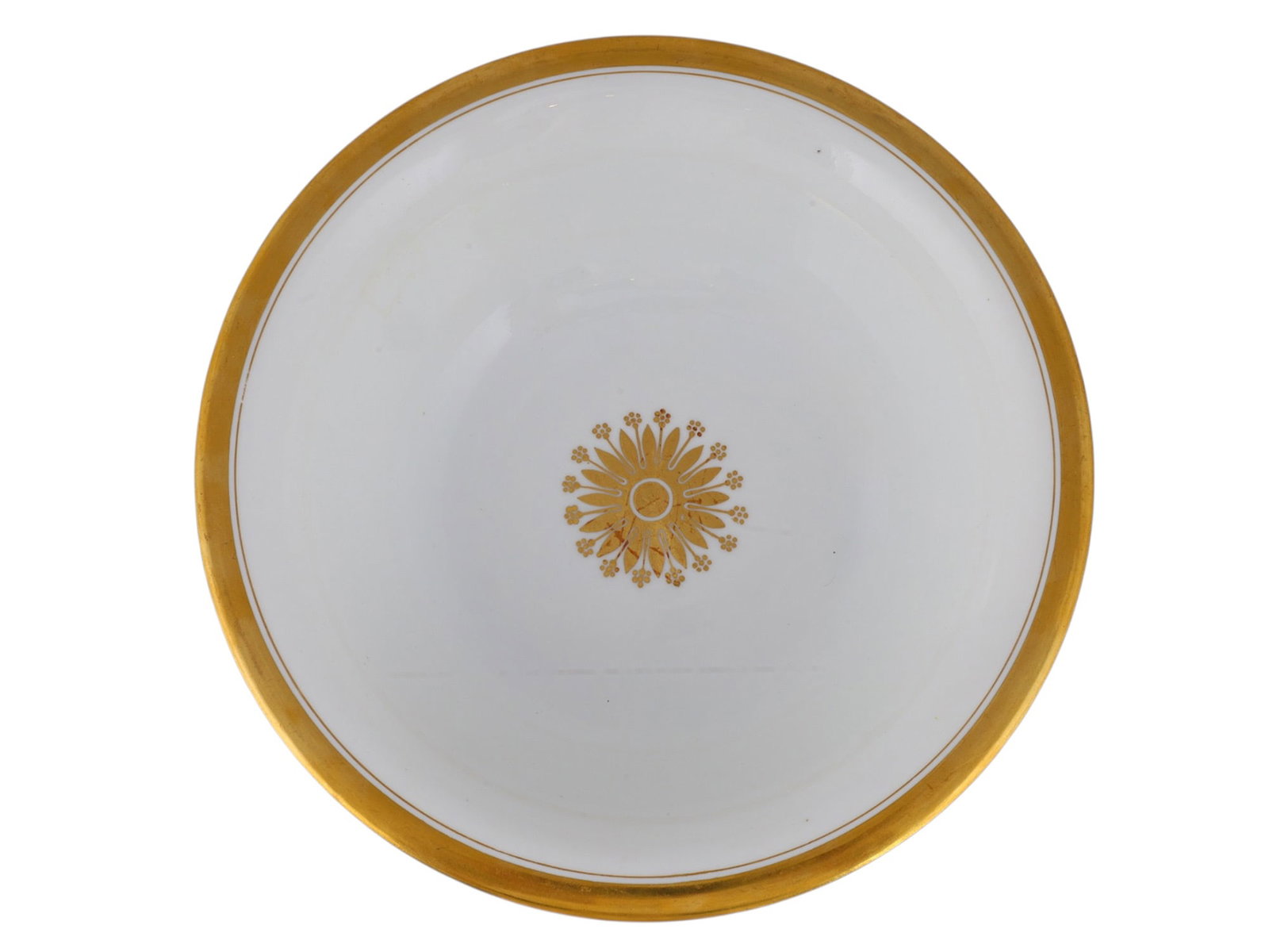 A LARGE RUSSIAN PORCELAIN BOWL FROM THE BABIGON SERVICE BY THE IMPERIAL PORCELAIN FACTORY, ST.: Of circular form with a deep rounded body raised on a low foot. The interior is centered by a gilt rosette, while the broad rim is decorated with a pale grey band of gilt flowering vines framed by gil