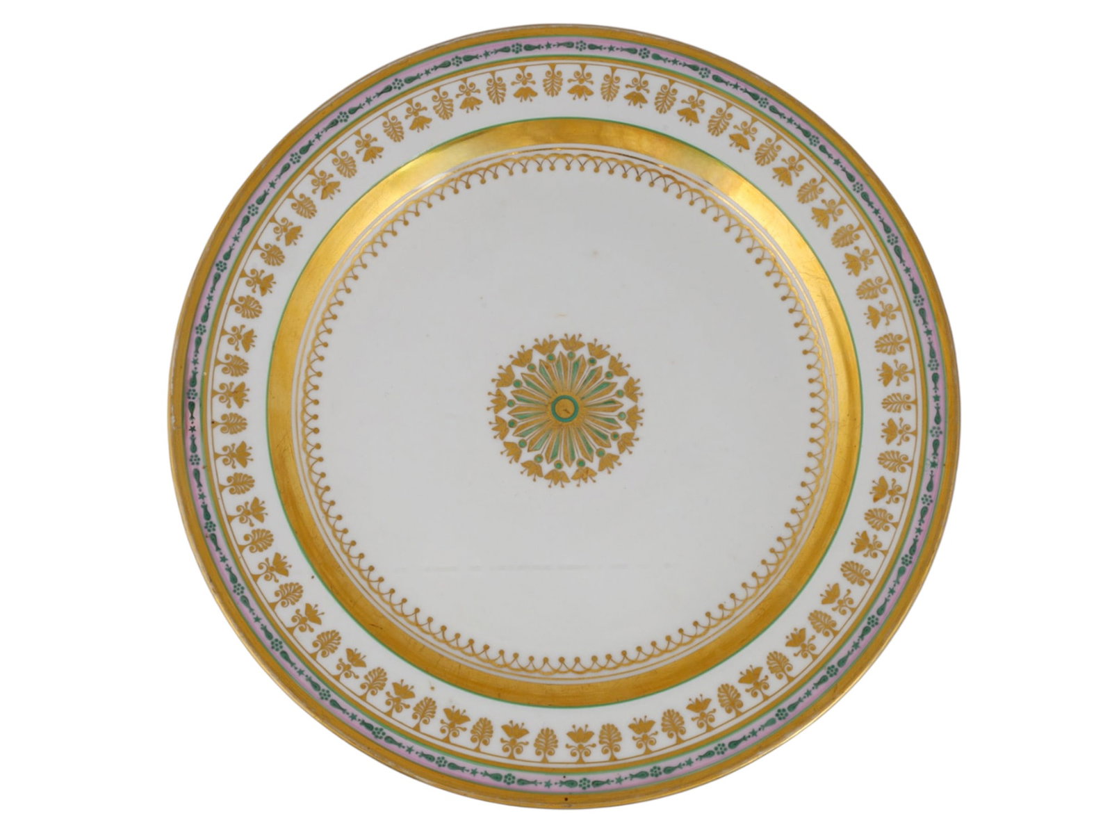A LARGE RUSSIAN PORCELAIN CHARGER FROM THE BABIGON SERVICE BY THE IMPERIAL PORCELAIN FACTORY, ST.: Of circular form, the center decorated with a gilt and green rosette enclosed by a gilt pendant border and a broad gilt band. The rim is painted with alternating gilt anthemia and palmettes, beneath a