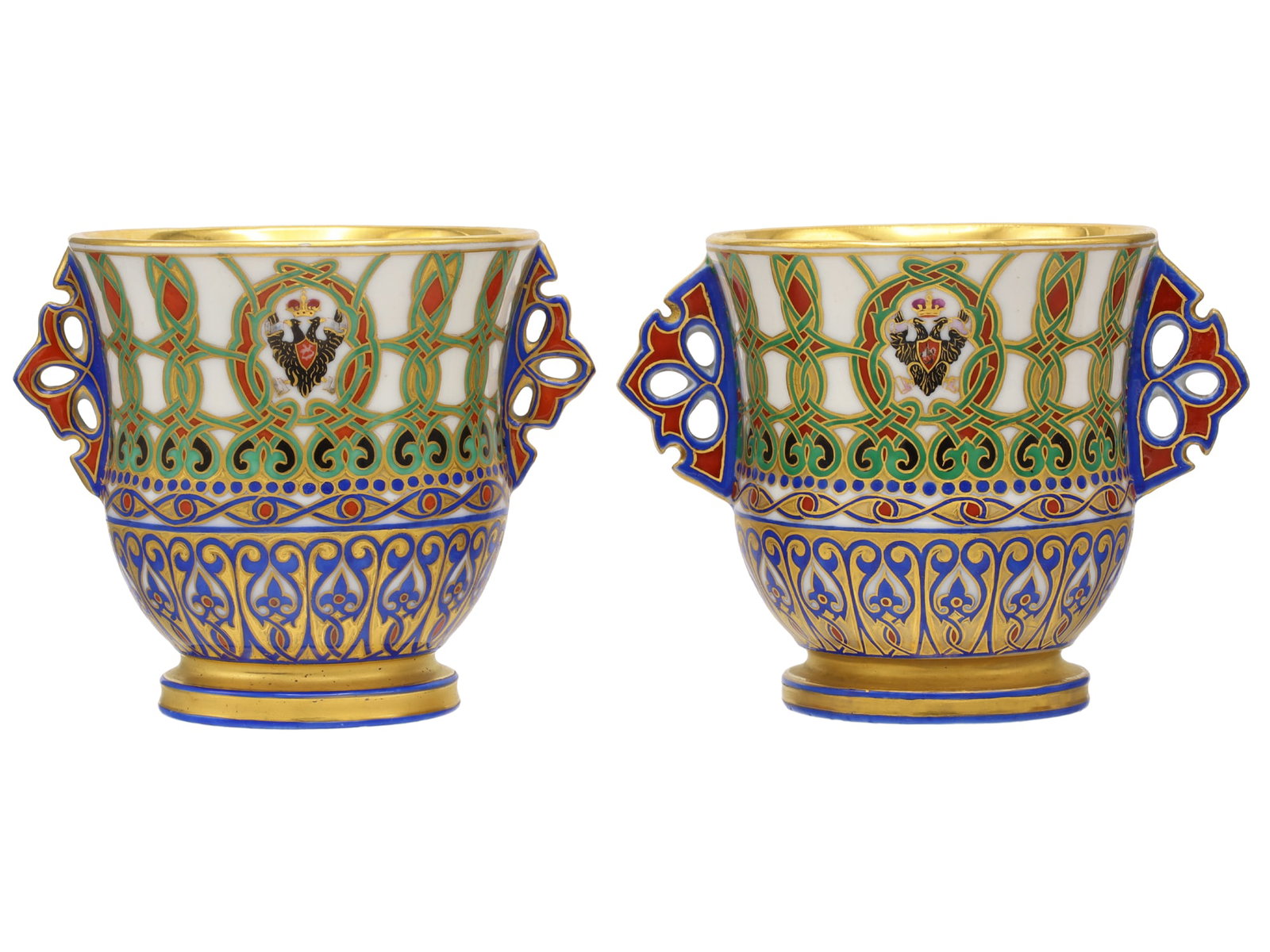 A PAIR OF RUSSIAN IMPERIAL PORCELAIN ICE CUPS FROM THE SERVICE OF GRAND DUKE KONSTANTIN NIKOLAEVICH: Imperial Porcelain Manufactory, St. Petersburg, period of Nicholas I, circa 1848. Each of tapering cylindrical form with a spreading foot and a pair of pierced foliate handles, richly painted and gilt