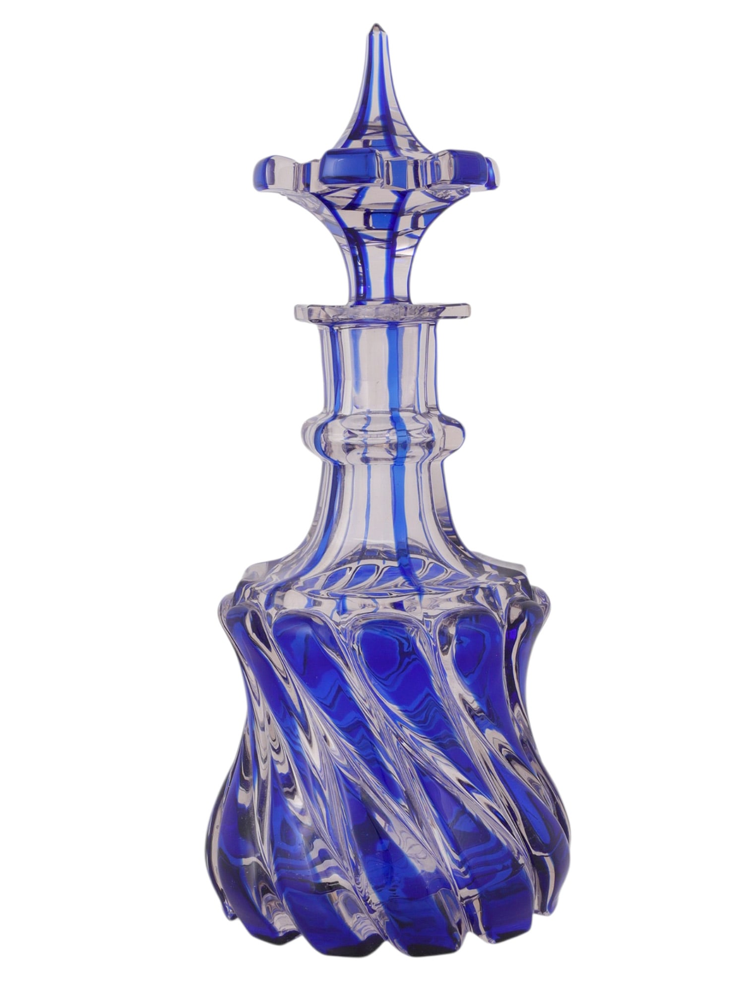 A RUSSIAN CUT-GLASS DECANTER AND STOPPER, IMPERIAL GLASS FACTORY, ST PETERSBURG, LATE 18TH?EARLY: Of waisted baluster form, the body is cut with alternating opposing teardrop-shaped panels of cobalt-blue and colorless glass arranged in a dynamic spiral pattern. The tall neck is encircled by a mold