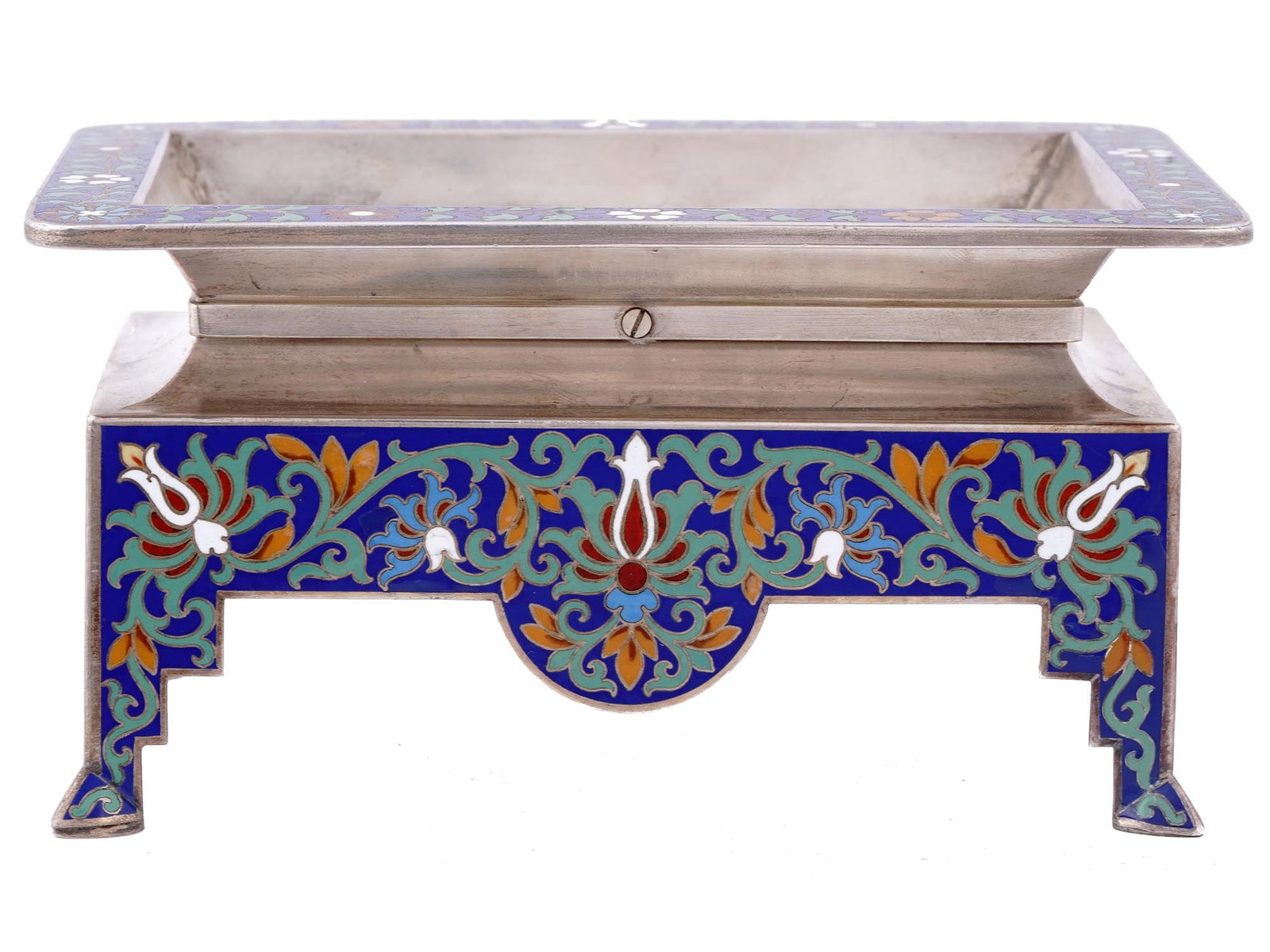 A RUSSIAN SILVER AND CLOISONNE ENAMEL CARD TRAY, 1882-1899: Grachev, St. Petersburg, 1882-1899.Of rectangular form, raised on four shaped feet, the bottom half of the tray and the border of the upper half decorated with foliate scrolls enameled in champleve.Ha