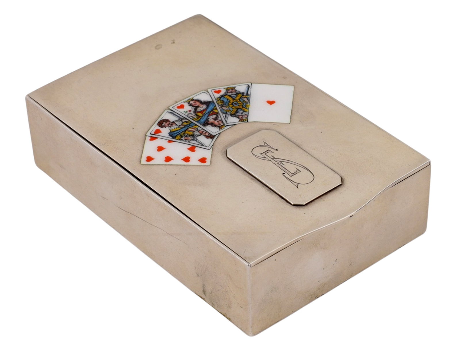 A RUSSIAN SILVER AND ENAMEL PLAYING-CARD CASE, GRACHEV BROTHERS, ST. PETERSBURG, 1908?1917: Of rectangular form with a hinged cover, the front applied with a fan of five playing cards finely painted in polychrome enamel. Above is a raised rectangular plaque engraved with an intertwined monog