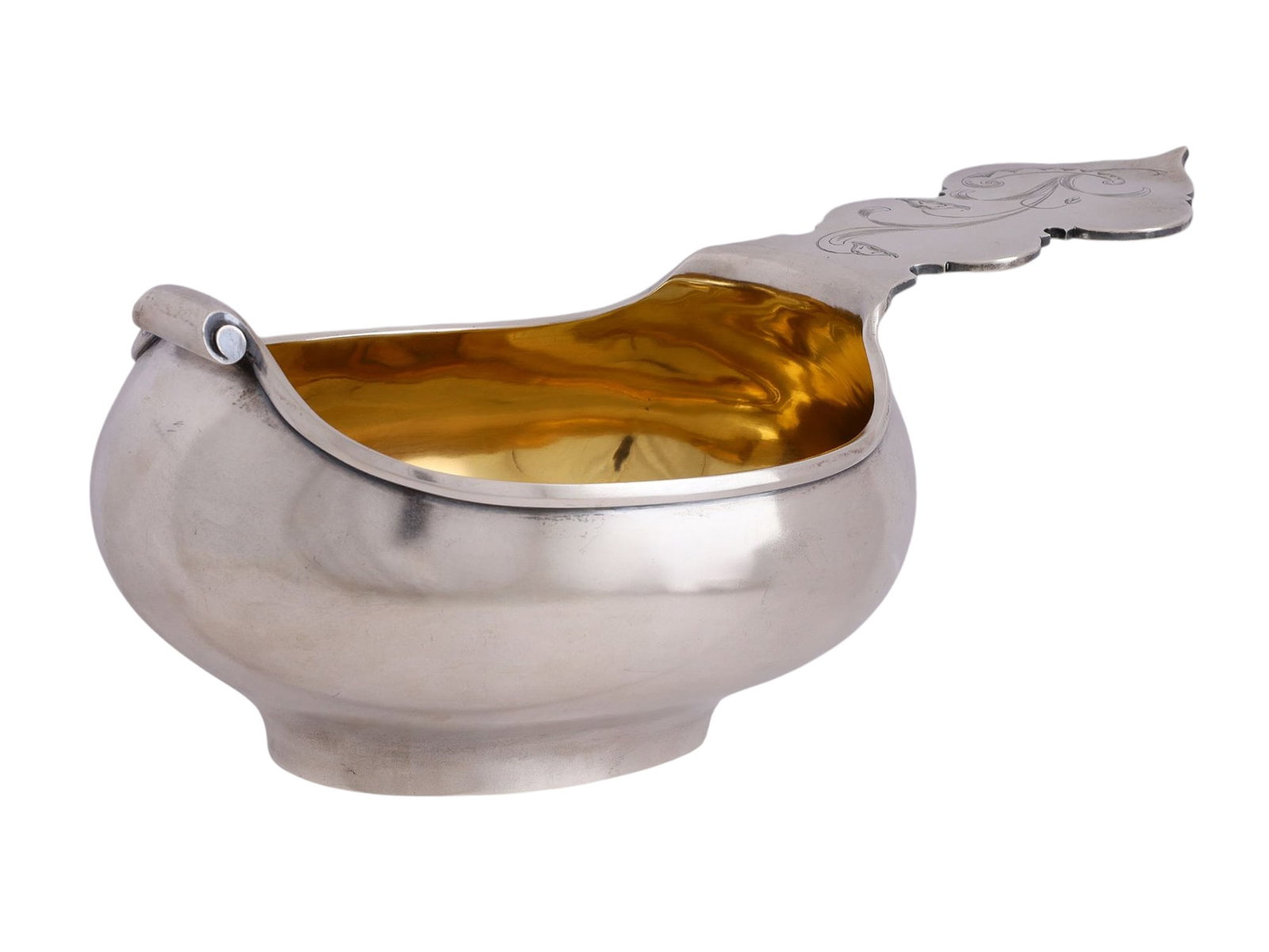 A LARGE RUSSIAN SILVER KOVSH, LIUBAVIN, 1899-1908: Lyubavin, Moscow, 1899-1908.Of traditional oval form with a shaped handle, the interior richly gilt, the exterior plain and polished. The handle is engraved with a scrolling foliate design.Hallmarks: 