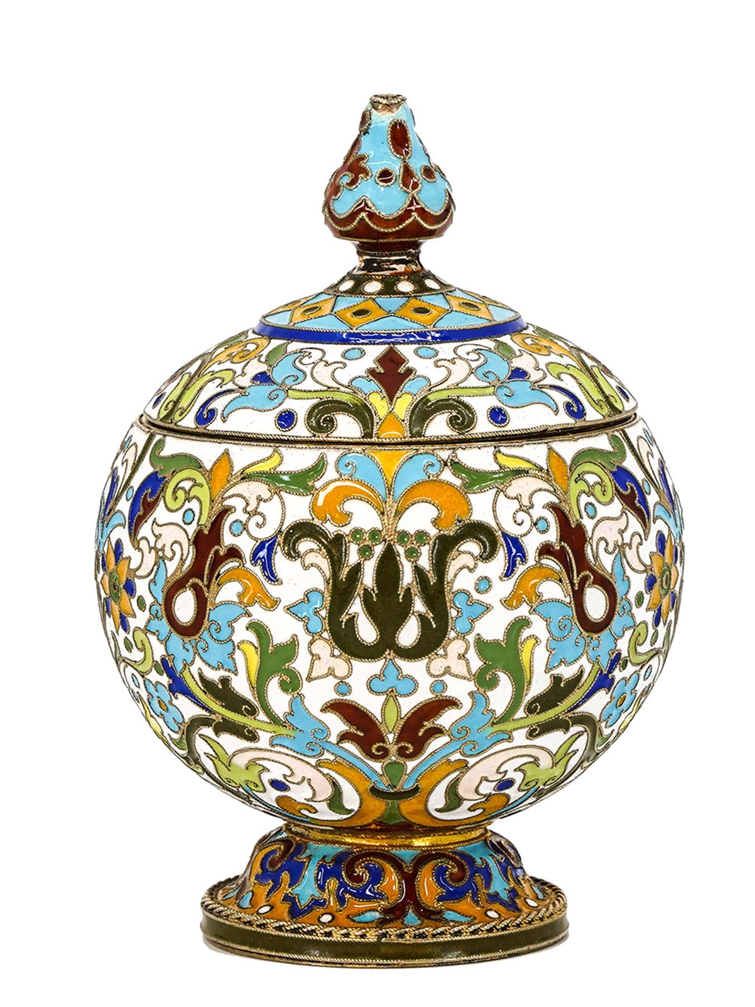 A RUSSIAN GILT-SILVER AND ENAMEL JAR BY F. RUCKERT, MOSCOW, 1899-1908: Of globular form, the lid with a baluster finial, polychrome foliage entirely enameled in shades of turquoise, lapis, pale pink, and green against an opaque white ground, on a spreading foot. Gilded i