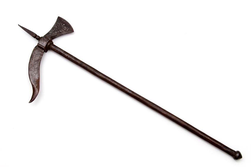 Early Indo-Persian Silver Inlaid Battle Ax - War Hammer: Of all steel with a heavy thick head having a flamboyant double edged counter-punch, all with heavy patina and partially worn silver damascene decorations. Good condition, head turns around the shaft,