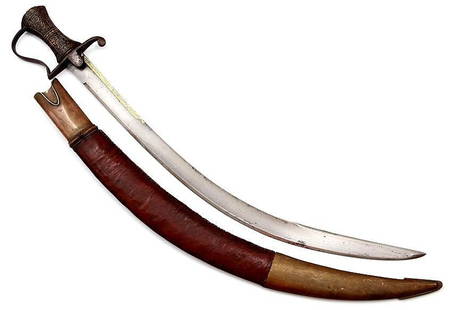 RARE AND UNUSUAL ANGLO INDIAN PRESENTATION SWORD: Very unusual and important Indian Presentation battle saber for an English officer, having a fine carved ivory grip mounted with an English 1796 cavalry style steel guard. Blade of significant rarity