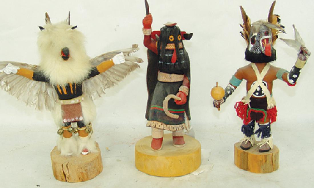 3 Hopi Kachina Carvings: Late 1900s, Includes a fine one-piece style "Soyok Yuhti" (Ogre Woman) by Carion Harvey ca. 1997 and two more traditional dolls (a wolf and an eagle). All in very good condition with minor glued repai
