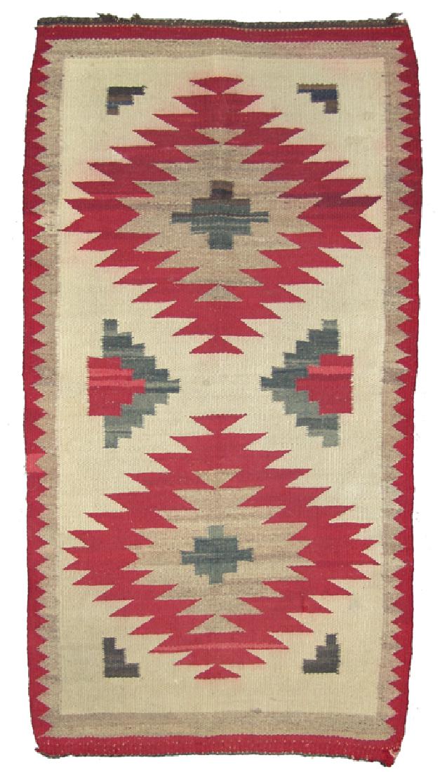 Navajo Rug/Weaving: Ca. 1940, Small homespun serrated table/altar rug done in classic red, tan, heather, and black (gray colors. Fair condition, some edge/end damage, soiled. 45" x 23"