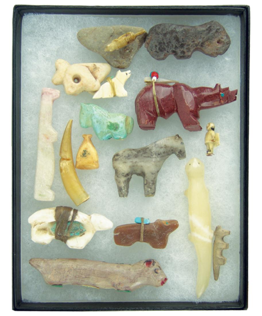 Zuni Stone Fetishes: Various Ages, Collection of 14 hand carved stone and bone fetishes and figures in turquoise, catlinite, shell, and other materials. All in good condition, one repaired. Largest 4"