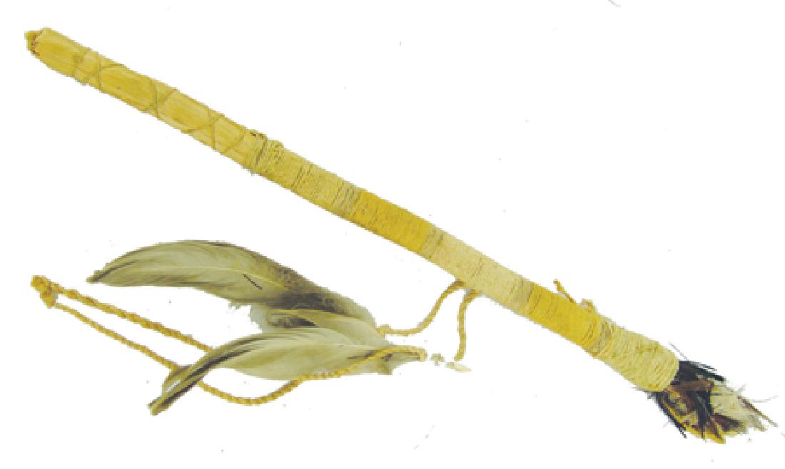 Southwest Ceremonial Item: Early 1900s, Single string-wrapped husk-covered wooden marker or stick with feather decorations, marked "Zuni Prayer Stick." Good condition. 13"