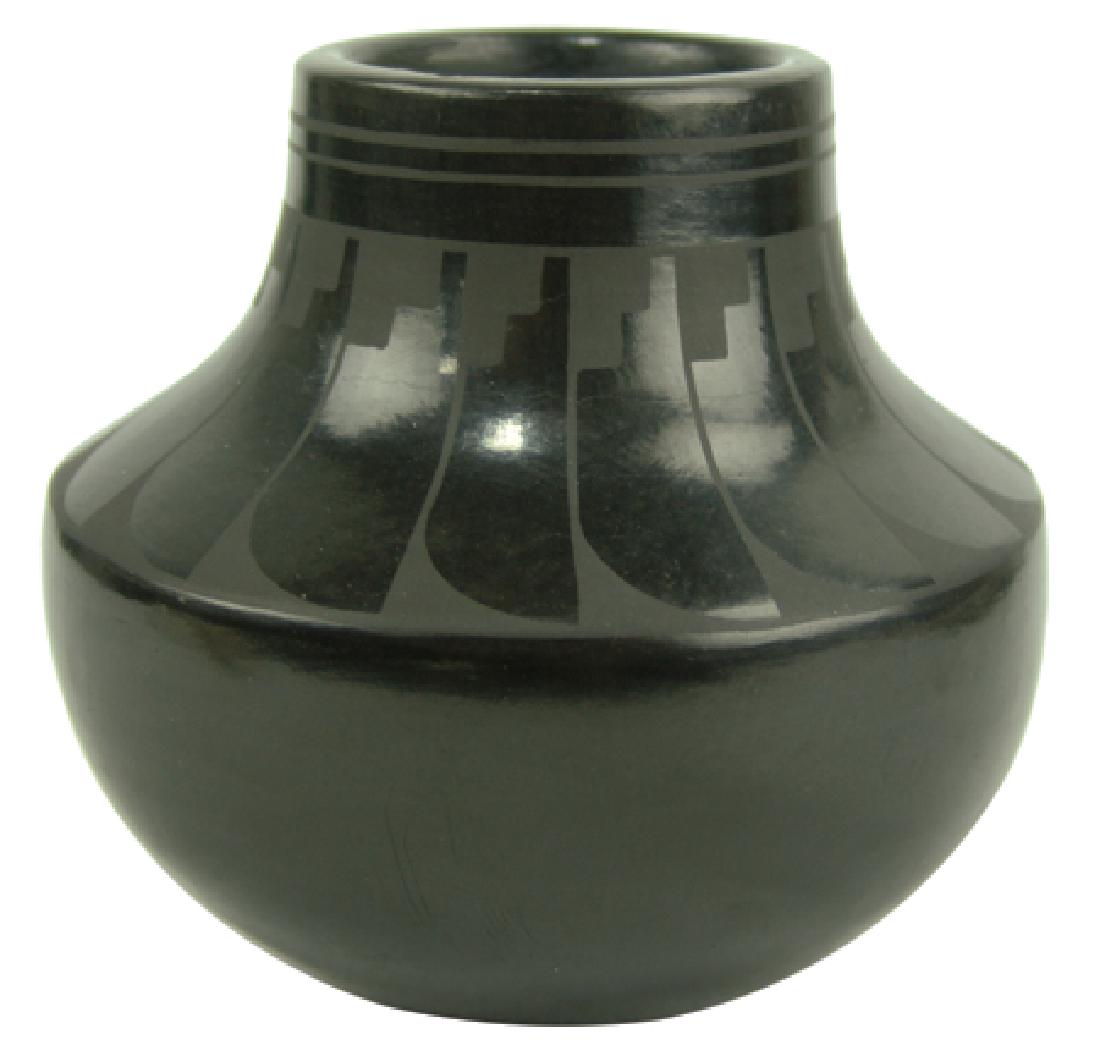 San Ildefonso Pottery Jar - Alice & Ruben Martinez: Ca. 1980s, Small matte black-on-black pottery jar with wide radiating feather design. Ruben is Alice's son and they have been collaborating since the '80s. Very good condition. Alice is Maria's grandd