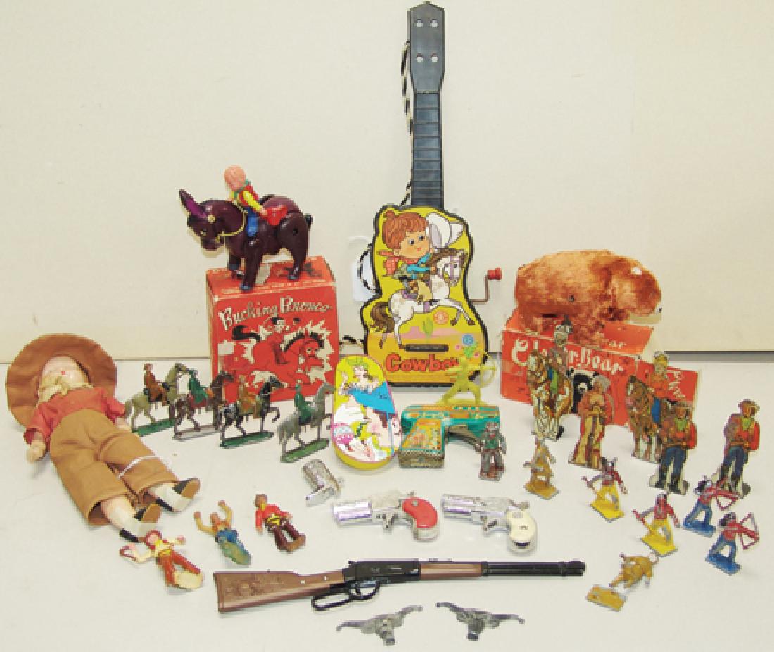 Box Lot of Vintage Toys: Various Ages, Collection of vintage toys including a 1968 Mattel cowboy wind-up guitar (winds but no music); a 1950s cowboy doll with clothes & hat; a "Clever Bear" that walks & turns its head, with w