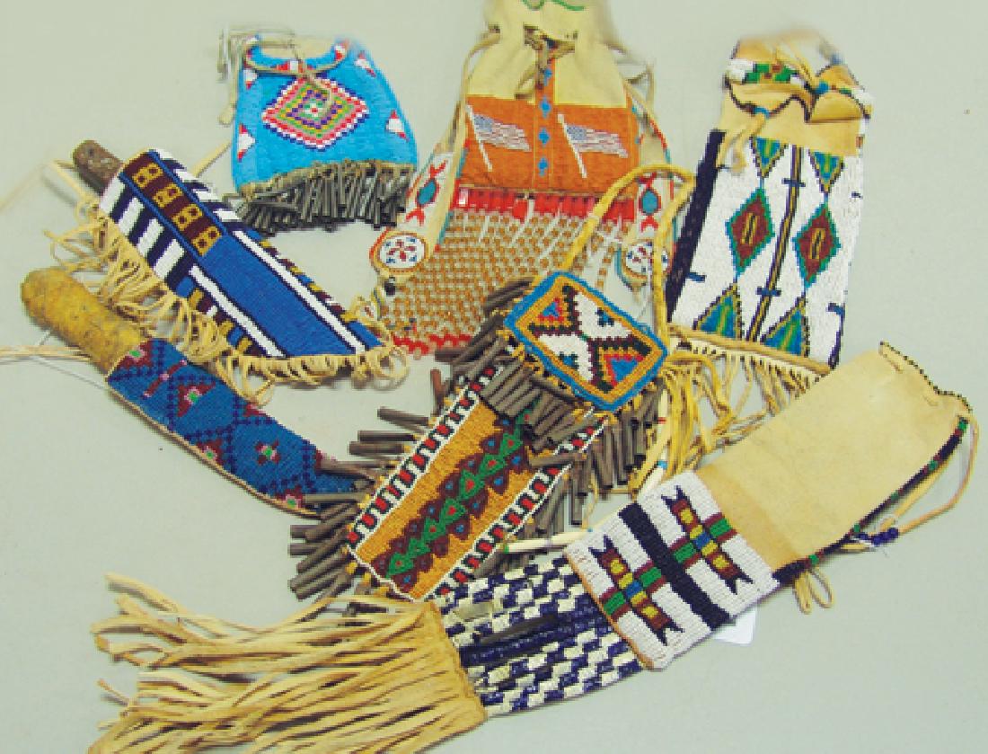 Box Lot of Beadwork: Various Ages, Collection of seven beadwork items including a beaded bag with geometric design and tin cone suspensions; a beaded drawstring bag with flag design on both sides and beaded fob on drawstr