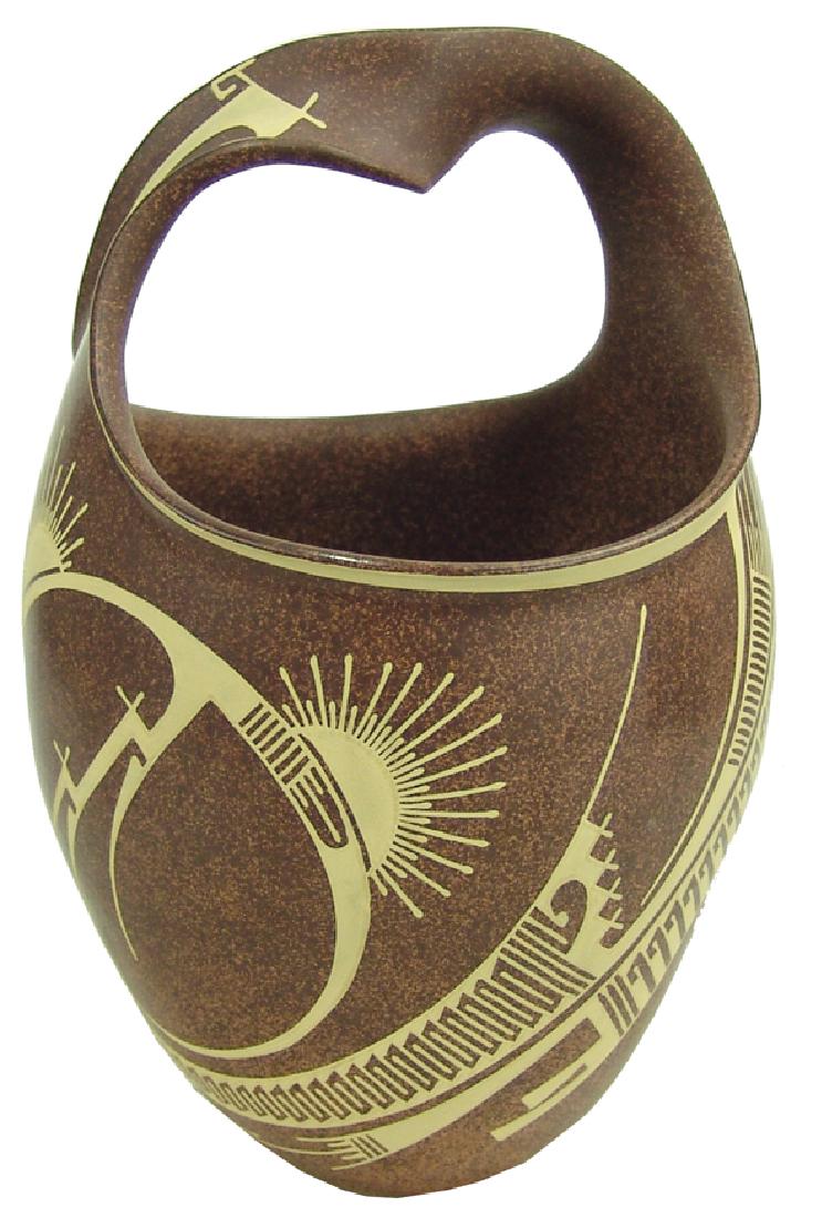 Mata Ortiz Pottery Jar - Jose Quezada: Unique original design thin walled jar with twist handle and fine painted motif and done with molted brain clay. Excellent condition.,Early 2000s,11" tall