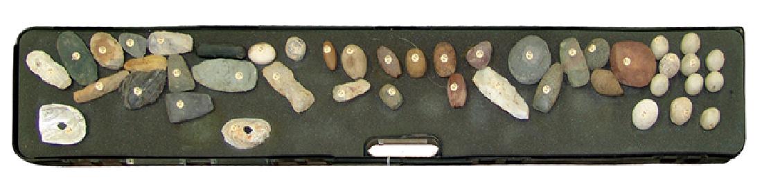 Stone Artifact Collection: Fantastic group of (44) pre historic stone tools, blades, etc. including fine small celts plus many grinding stones, axe heads, a plumb bob, knapped blades, and two shell decorations. Most from South 
