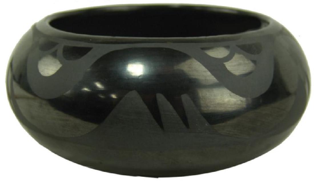 San Ildefonso Pottery Bowl - Marie & Santana: Wonderfu, black-on-black rounded pottery bowl with popular Avanyu serpent design. Done by Maria Mantinez (1887-1980) and her daughter in law, Santana Roybal (1909-2002). Very good condition, minor scu