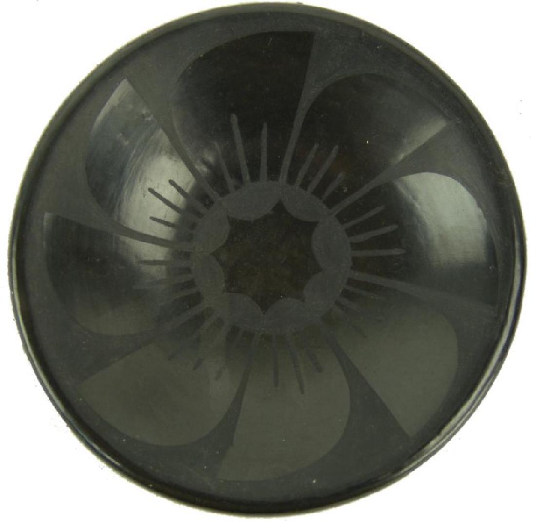 San Ildefonso Plate - Maria Martinez (1887-1980): Small, early traditional black-on-black pottery dish with radiating feather design purchased from Maria in 1966, but never signed. Very good condition. **Lots #71-75, 101-105, 571-575, & 601-615,,1-1/