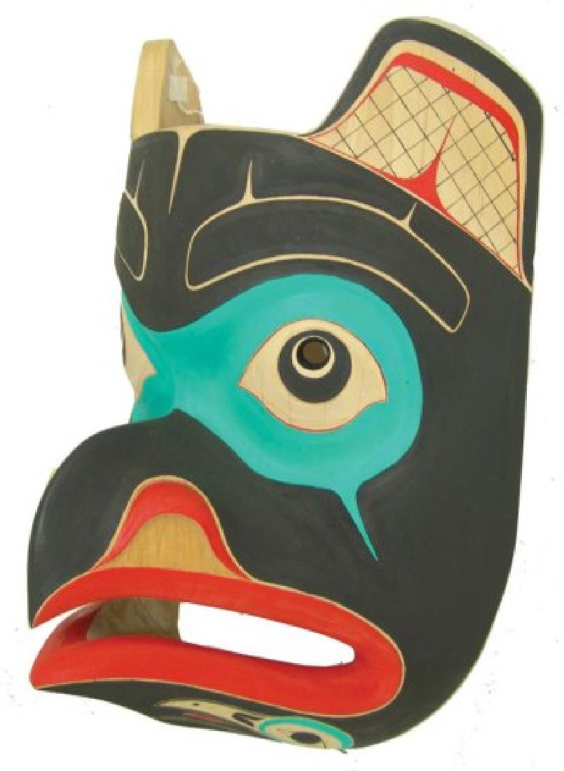 NW Coast Mask: Beautiful hand carved and painted Haida alder wood mask this the blunt nosed raven which is often confused with the eagle. Excellent condition.,,13" x 9"